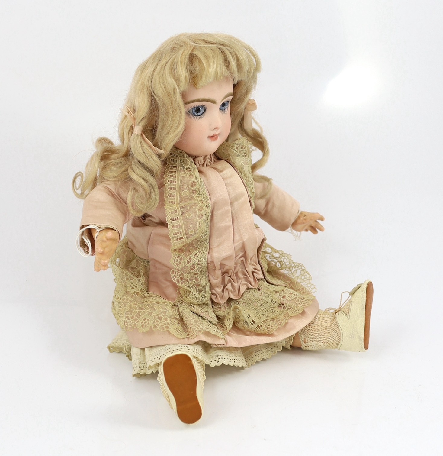 A Danel and Cie moulded bisque doll, French, 1891, 15.75in.